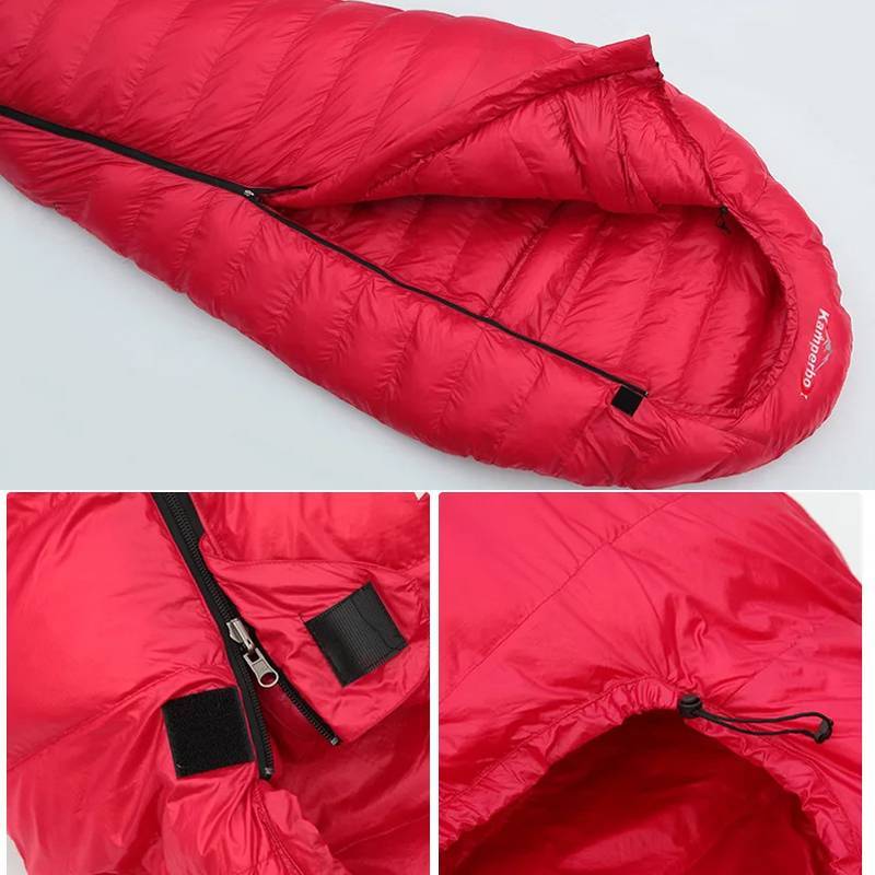 Red sleeping bag with black zipper and drawstring on a light gray background